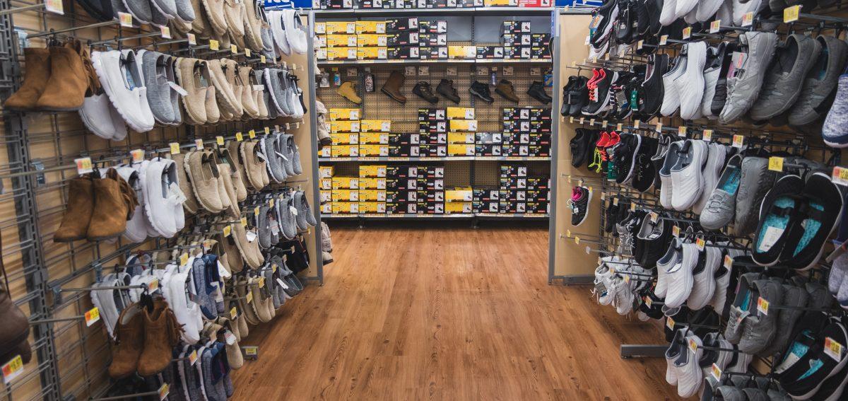 shoes in aisle at retail store