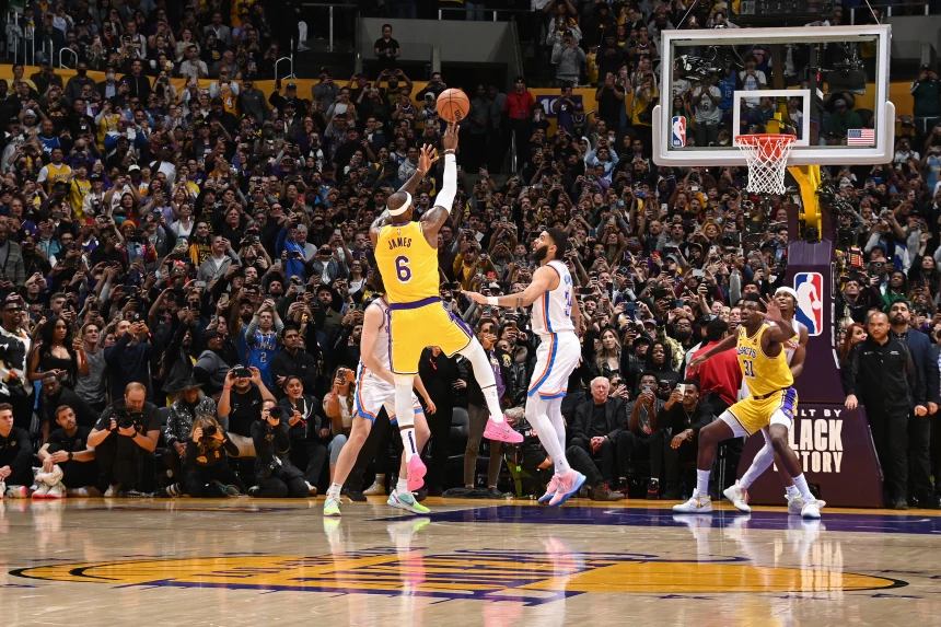 LeBron James shoots the ball to break Kareem Abdul-Jabbar's all-time scoring record on Tuesday in Los Angeles. 

Andrew D. Bernstein / NBAE via Getty Images